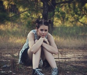 image girl sitting on grass